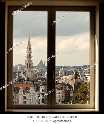 View of the Town Hall tower and city centre through a window in Brussels, Belgium