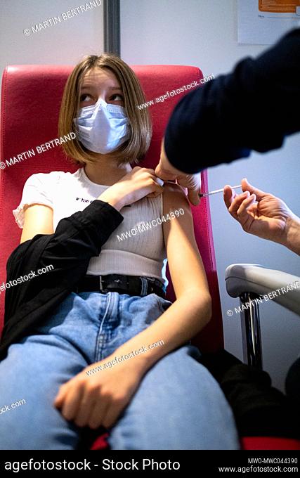 Vaccination of a twelve year old child with a Pfizer vaccine at a Covid-19 vaccination center in Dinan, Brittany. France