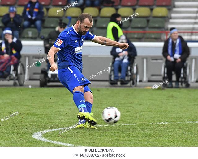 Karlsruhe's Erwin Hoffer shoots the 3:2 goal during the 2nd Bundesliga soccer match between Karlsruher SC and Arminia Bielefeld at the Wildparkstadion in...