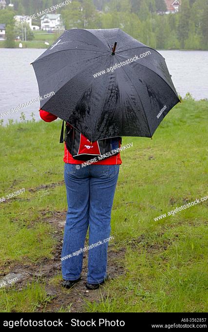 Umbrella in rainy weather. Photo: André Maslennikov