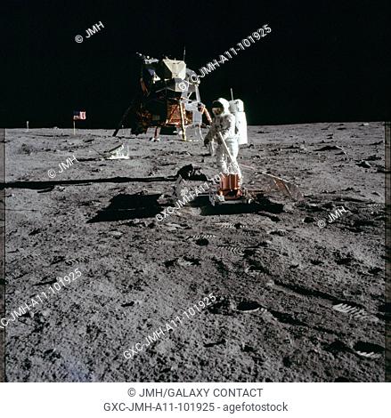 Apollo 11 hasselblad image from film magazine - eva. (20 july 1969) --- the deployment of the early apollo scientific experiments package (easep) is...