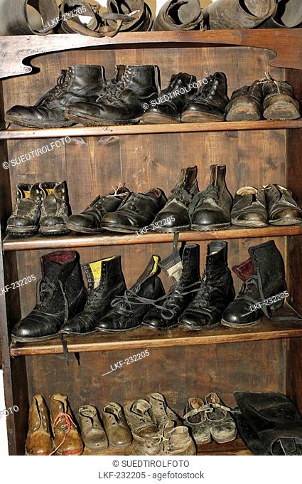 Shoes at the cobblers, South Tyrolean local history museum at Dietenheim, Puster Valley, South Tyrol, Italy