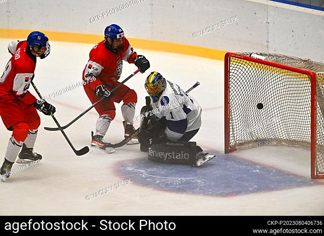 Adam Jecho of Czech Republic, left, scores during the Hlinka Gretzky Cup, annual under-18 hockey tournament, semifinal, Czech Republic vs Finland on August 4
