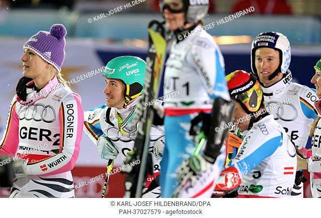 Maria Hoefl-Riesch (L-R), Felix Neureuther, Fritz Dopfer and Lena Duerr of Germany react during the Nations Team Event at the Alpine Skiing World Championships...