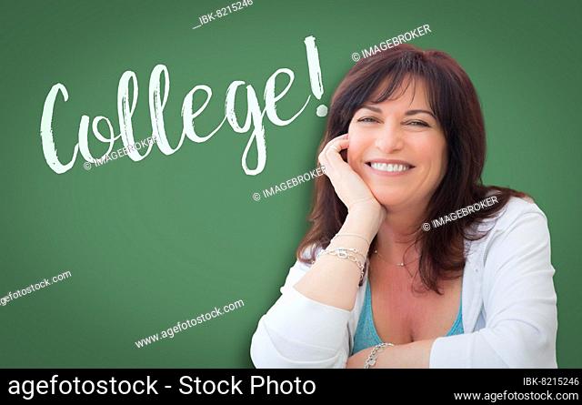 College written on green chalkboard behind smiling middle aged woman