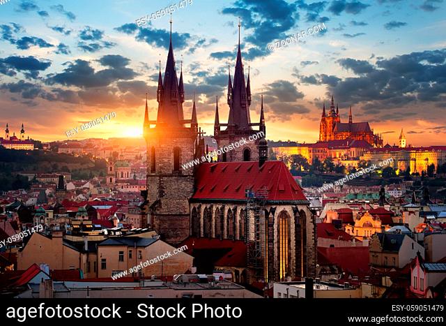Tynsky temlpe and St Vitus cathedral at sunrise in Prague