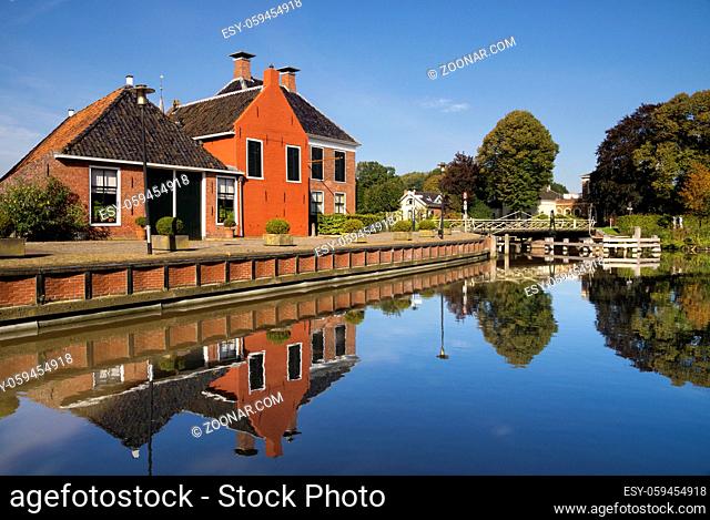 The village Onderdendam on the Boterdiep canal in the Dutch province Groningen