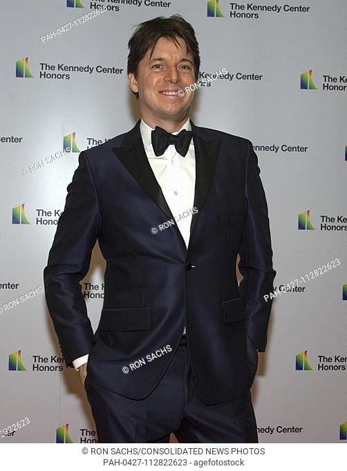 Violinist Joshua Bell arrives for the formal Artist's Dinner honoring the recipients of the 41st Annual Kennedy Center Honors hosted by United States Deputy...