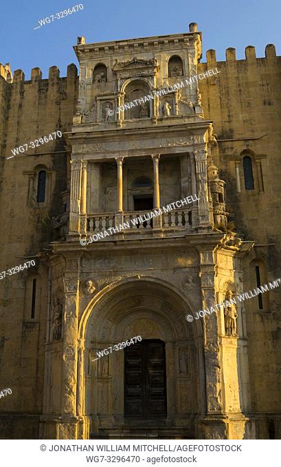 COIMBRA, PORTUGAL - August 13, 2016: The northern facade of the Old Cathedral of Coimbra in the historic university city of Coimbra, Portugal