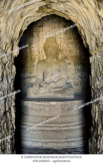 Myanmar, Rakhine State, Mrauk U, Laymyethna pagoda, (15th C), Seated Buddha with Bhumiparsha mudra or ""earth witness"" mudra. .