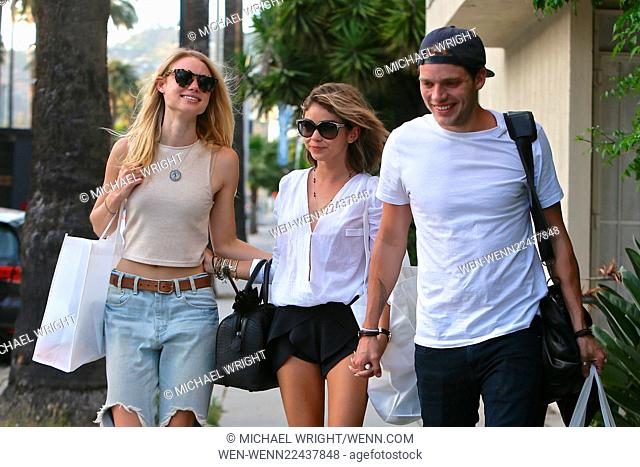 Sarah Hyland, Dominic Sherwood and Lucy Fry out and about in Los Angeles. Sarah wearing a Merritt Charles top and shorts and accenting the outfit with jewelry...