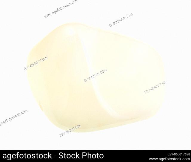 closeup of sample of natural mineral from geological collection - polished white agate gemstone isolated on white background