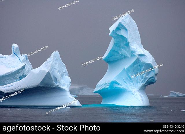 Antarctica, Antarctic Peninsula, Iceberg floating off the western Antarctic Peninsula, Antarctica, Southern Ocean