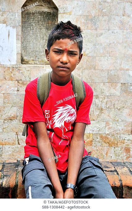 Young generation in Nepal changing a lot  But still many of them put bindi in the forehead even if wearing red manga T shirts