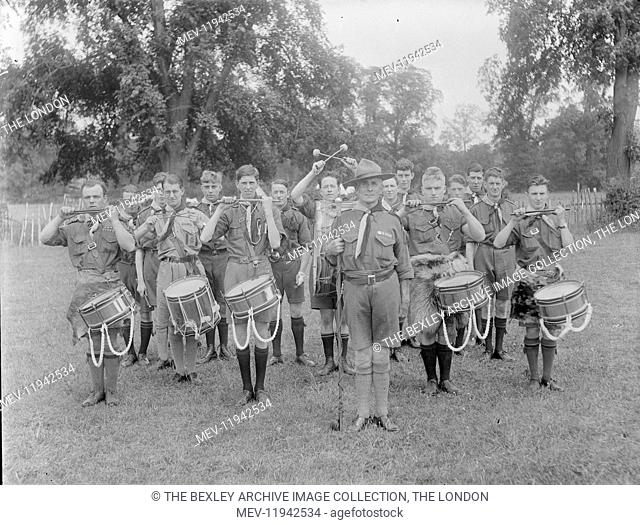 Shows members of the 1st Bexley Scout Troop Drum and Fife Band, from left to right: M Tamplin, H Martin, T Calvert, W Turner, H Jamies, R Catt, J Penforld