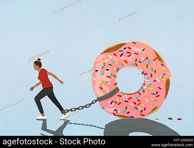 Large sprinkled donut chained to let of woman trying to walk