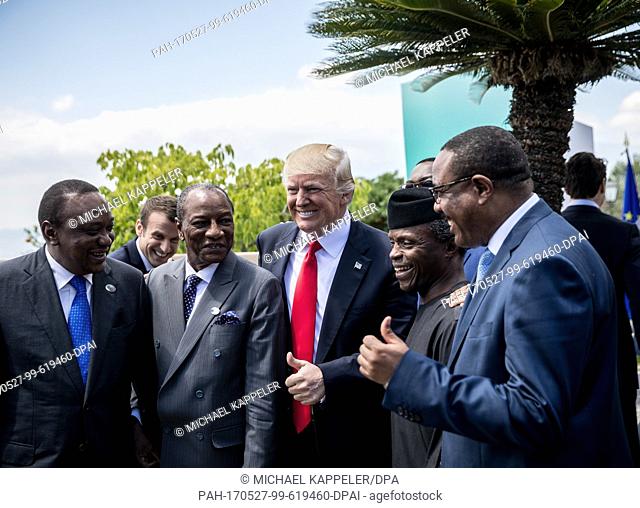 USÂ President Donald Trump (C) has a conversation with Uhuru Kenyatta (Kenya, L-R), Alpha Conde (Guinea), Yemi Osinbajo (Nigeria) and Hailemariam Desalegn...
