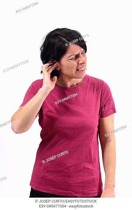 woman with pain on ear on white background