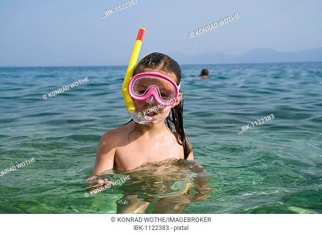 Girl with diving goggles and a snorkel, 6 years old, Makarska, Dalmatia, Croatia, Europe