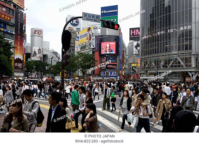 Shibuya crossing in front of the Shibuya train station is one of Tokyo's busiest city centers, Tokyo, Japan, Asia