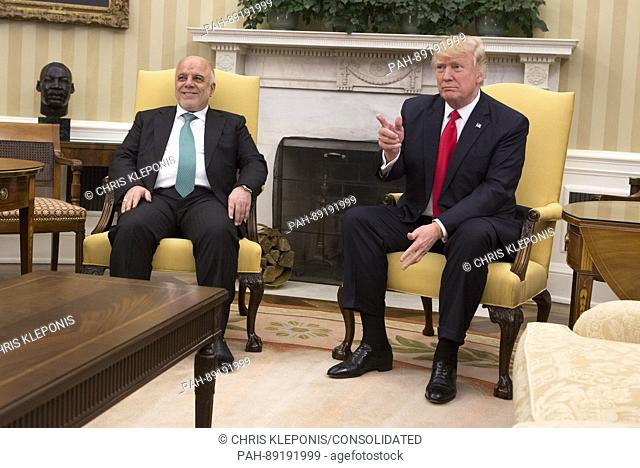 United States President Donald J. Trump and Prime Minister Haider al-Abadi of Iraq pose for photos before holding a meeting at the White House in Washington DC...