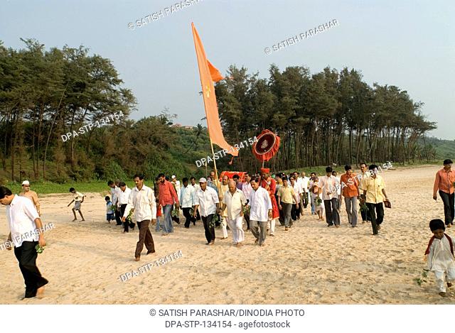 Palkhi or palanquin procession of dussera and vijayadashmi at Ganpatipule ; district Ratnagiri ; state Maharashtra ; India