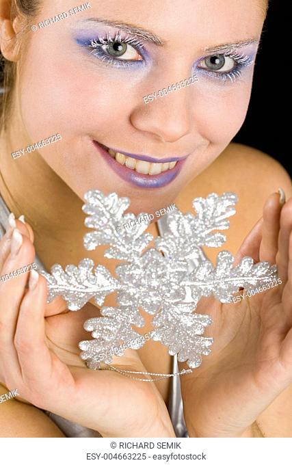 portrait of woman with snowflake