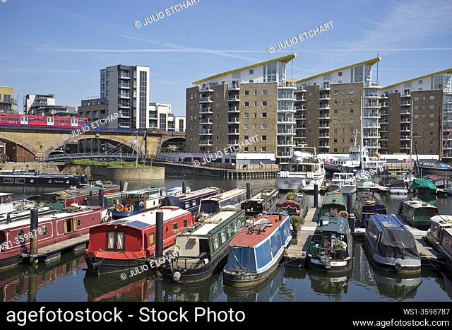 Views of yachts and narrow boats at Limehouse Marina in east London, UK