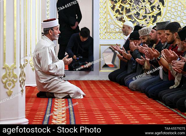 RUSSIA, SIMFEROPOL - DECEMBER 9, 2023: Mufti Emirali Ablayev (L) of Crimea and Sevastopol conducts a mass prayer at the newly built Cathedral Mosque