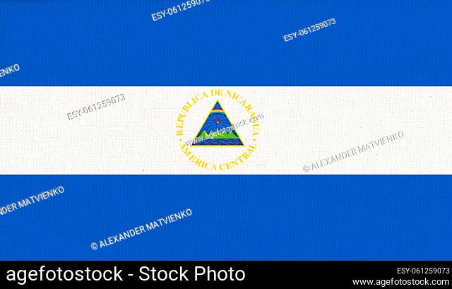 Flag of Nicaragua. Nicaragua flag on fabric surface. Fabric Texture. National symbol. Republic of Nicaragua