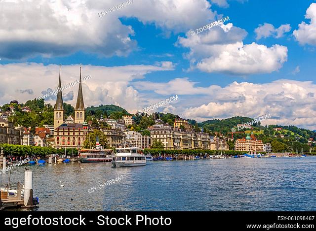 View of Lucerne with Church of St. Leodegar from lake, Switzerland