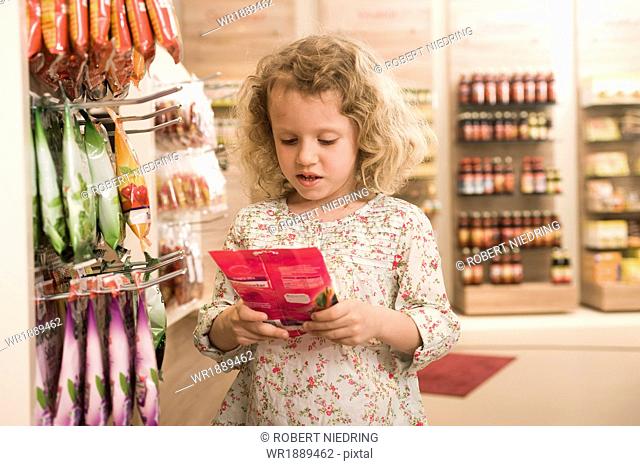 Little Girl In Pharmacy, Munich, Bavaria, Germany