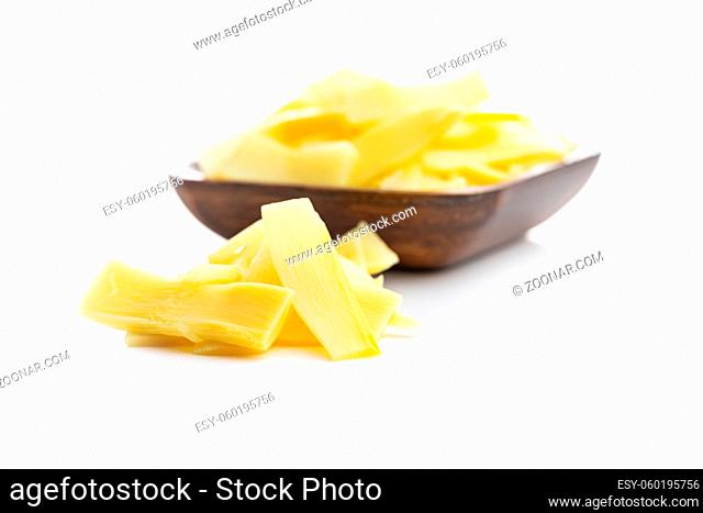 Sliced canned bamboo shoots isolated on white background