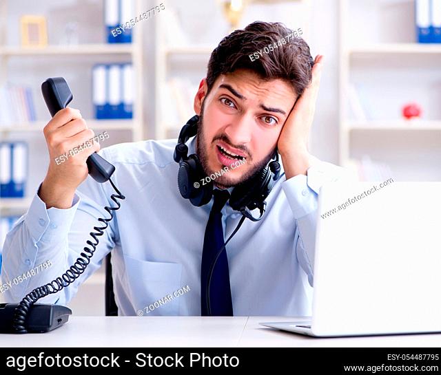 The call center employee working in office