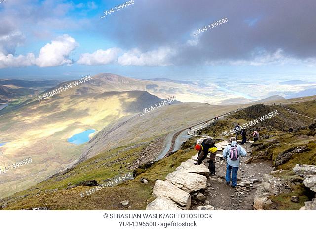 People walking along the Llanberis Path one of the routes up Snowdon, Snowdonia National Park, Wales, UK, Europe