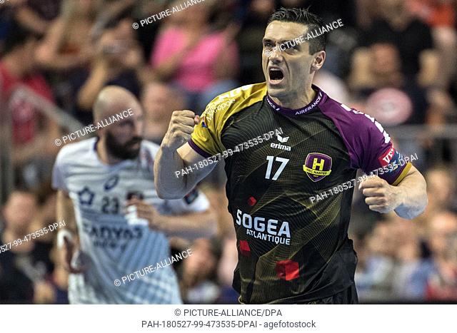 27 May 2018, Germany, Cologne: Handball Champions League final, HBC Nantes vs Montpellier HB at the Lanxess Arena: Kiril Lazarov of Nantes celebrates after a...