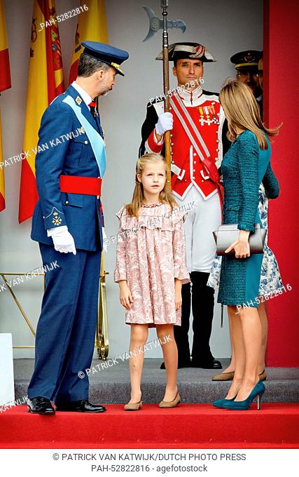 Spanish King Felipe, Queen Letizia (R) and Princess Leonor attend the military parade at the National Day in Madrid, Spain, 12 October 2014