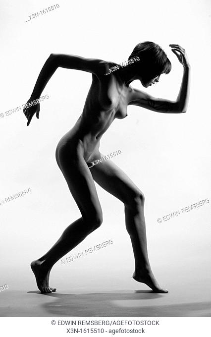 Nude female figure in silhouette