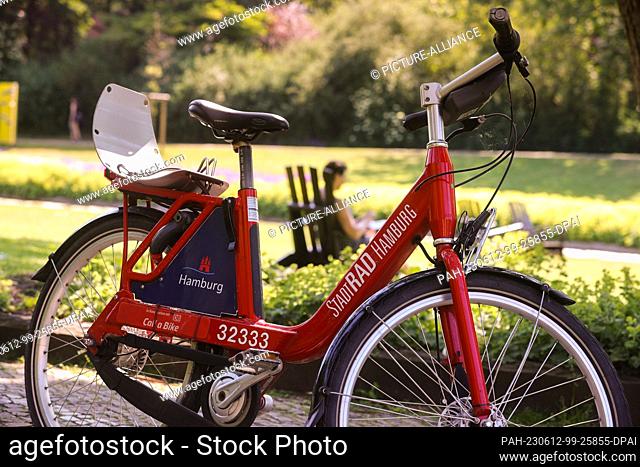 12 June 2023, Hamburg: A bike from Stadtrad Hamburg stands at a rental station in Hamburg. As of Tuesday, June 13, users can rent up to four bikes at the same...