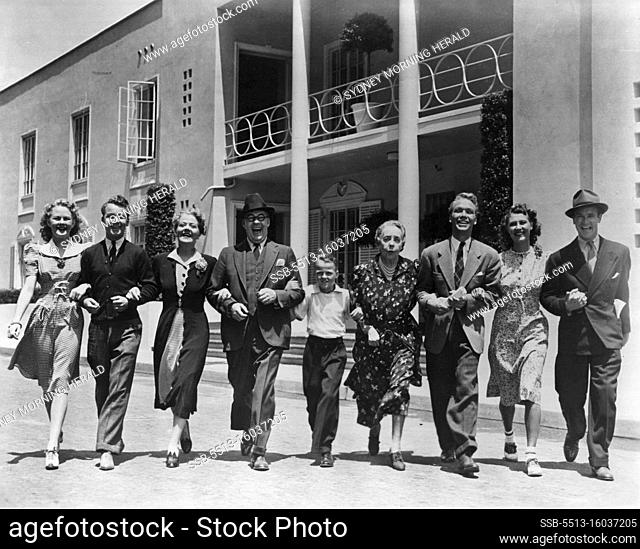 Company Reporting for Work... The cast for the latest Jones Family picture, ""Too Busy To Work, "" reports for work on the 20th Century-Fox lot all smiles and...
