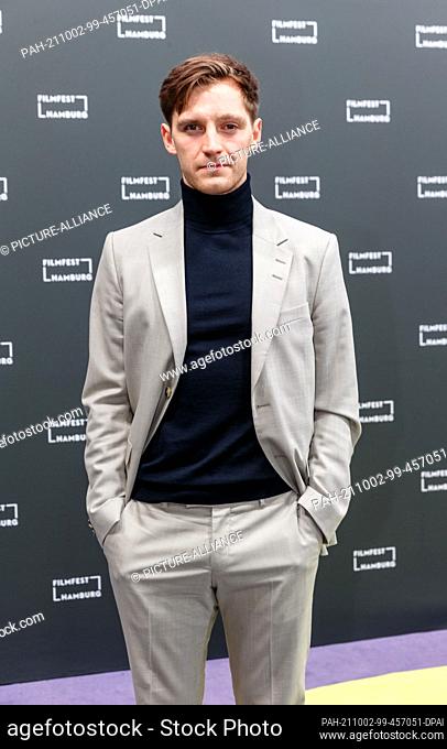02 October 2021, Hamburg: Actor Jonas Nay stands on the red carpet at the 29th Filmfest Hamburg for the film ""Du Sie Er & Wir""