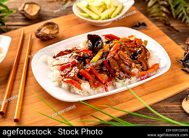 Plate of rice with vegetables. Vegetarian Chinese food