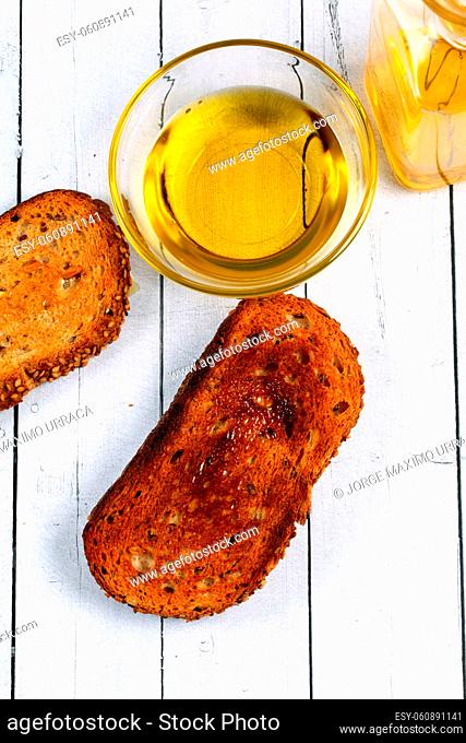 Slices of toasted bread with olive oil