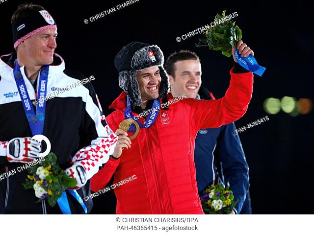 (L-R) Silver medalist Ivica Kostelic of Croatia, Gold medalist Sandro Viletta of Switzerland and Bronze medalist Christof Innerhofer of Italy pose with their...