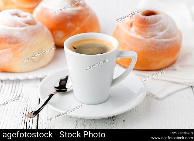 Mug of hot chocolate or cocoa with toasted bagel