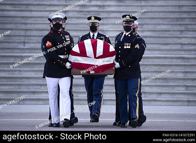 The casket of US Capitol Police Officer William Evans is carried by a joint service honor guard at the East Front of the US Capitol after lying in honor in the...