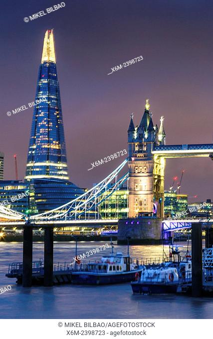 Tower Bridge, River Thames and The Shard skyscraper at night. London, United Kingdom, Europe