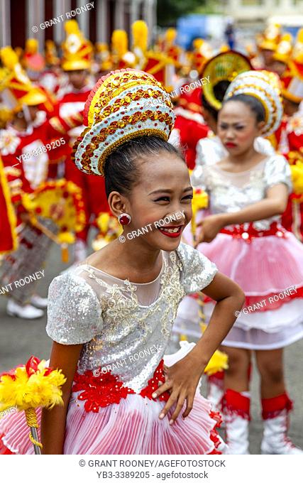 Elementary Filipino Schoolgirls Pose For The Camera During The Tambor Trumpa Martsa Musika (Drum & Bugle Corps) Contest, Dinagyang Festival, Iloilo