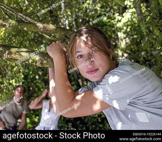 Young people enjoying themselves in native New Zealand bush