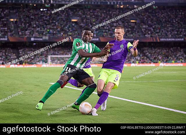 Seville, Spain. 15h, September 2022. Luiz Henrique (11) of Real Betis and Anton Nedyalkov (3) of Ludogorets seen during the UEFA Europa League match between...